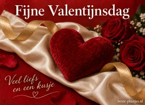 Een rood fluwelen hart is versierd met een gouden lint.